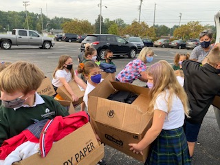 Coat Check Coat Drive in Louisville - Kentucky Refugee Ministries